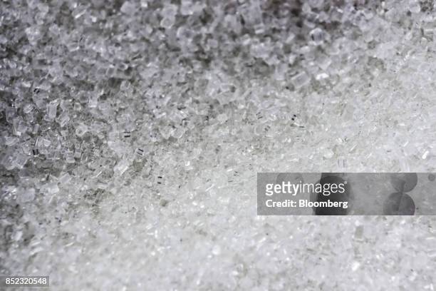 Piles of refined white sugar crystals sit at the ED&F Man Ltd. Refinery in Nikolaev, Ukraine, on Friday, Sept. 22, 2017. More sugar is coming to the...