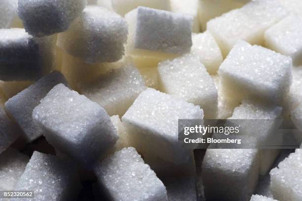 Piles of refined white sugar cubes sit at the ED&F Man Ltd. Refinery in Nikolaev, Ukraine, on Friday, Sept. 22, 2017. More sugar is coming to the...