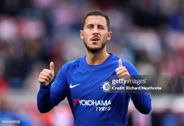 Eden Hazard of Chelsea celebrates his side's 4-0 victory after the Premier League match between Stoke City and Chelsea at Bet365 Stadium on September...