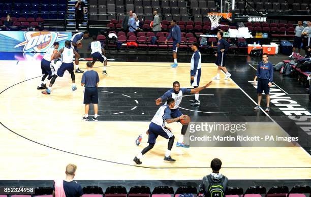 Oklahoma City Thunder's Kevin Durant guards Rodney McGruder, during the practice session at the Phones4 u Arena, Manchester.