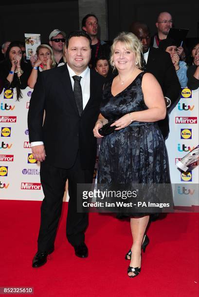 Paul Potts and wife Julie-Ann Potts arriving at the 2013 Pride of Britain awards at Grosvenor House, London.