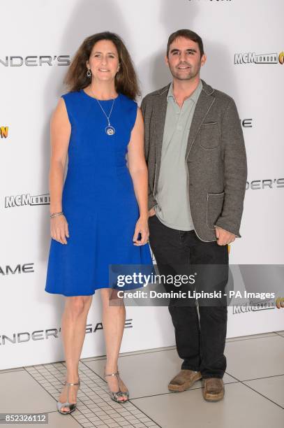 Producers Gigi Pritzker and Bob Orci attends a photocall for the film 'Ender's Game', at the Odeon cinema, Leicester Square, London.