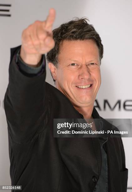 Director Gavin Hood attends a photocall for the film 'Ender's Game', at the Odeon cinema, Leicester Square, London.