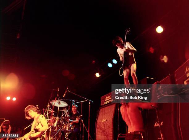 Photo of Bon SCOTT and AC/DC and Angus YOUNG and AC DC and Malcolm YOUNG and Mark EVANS and Phil RUDD; L-R: Malcolm Young, Mark Evans, Phil Rudd,...