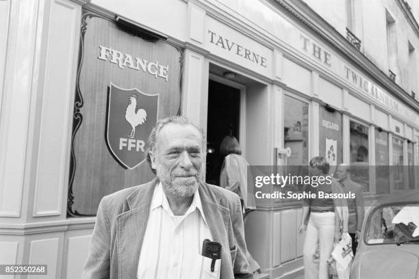 German-born writer Charles Bukowski stands outside his home in Los Angeles, California. He is a prolific writer in many genres, but is best known for...