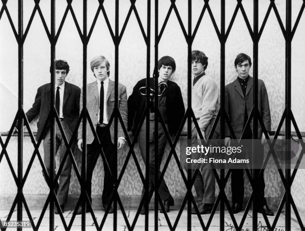 Photo of ROLLING STONES; L-R: Bill Wyman, Brian Jones, Keith Richards, Mick Jagger, Charlie Watts posed, group shot - in Marble Arch car park