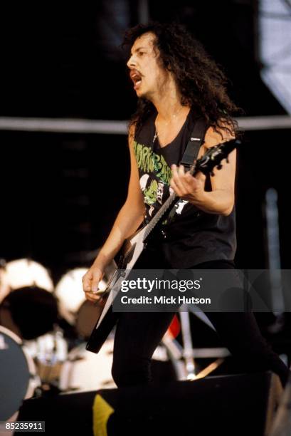 Photo of METALLICA and Kirk HAMMETT, Kirk Hammett performing live onstage, playing Gibson Flying V guitar