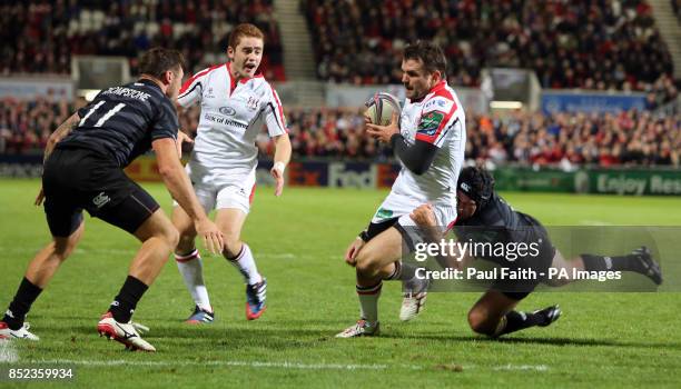 Ulsters Jared Payne is brought down by Leicester Tigers Julian Salvi during the Heineken Cup Pool Five match at Ravenhill, Belfast.