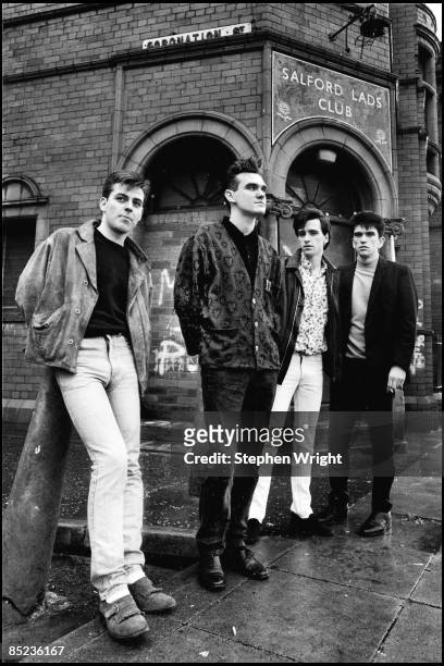 Photo of The Smiths and Mike JOYCE and Johnny MARR and Andy ROURKE and MORRISSEY; L-R: Andy Rourke, Morrissey, Johnny Marr, Mike Joyce - posed, group...