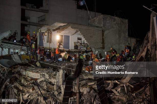 Rescuers search for survivors three days after the magnitude 7.1 earthquake jolted central Mexico killing more than 200 hundred people, damaging...