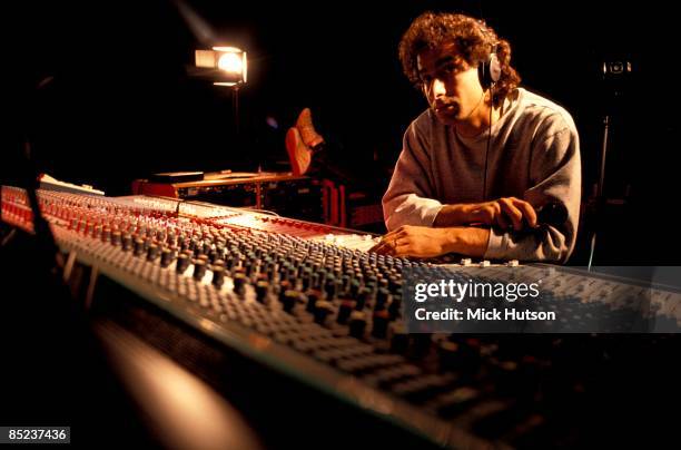 Circa 1970: Photo of SOUND ENGINEER; Sound engineer behind mixing desk