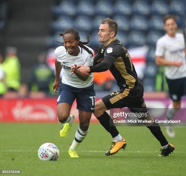 Preston North End's Daniel Johnson battles with Millwall's Byron Webster during the Sky Bet Championship match between Preston North End and Millwall...