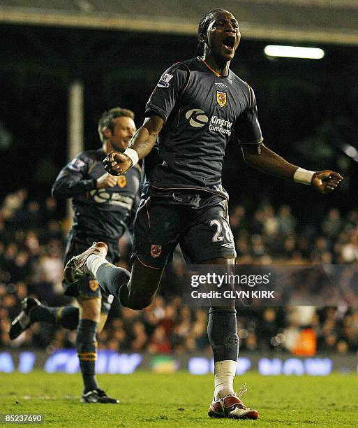 Hull City's Angolan striker Alberto Manucho celebrates scoring a goal during their Premier League match against Fulham at Craven Cottage, London, on...