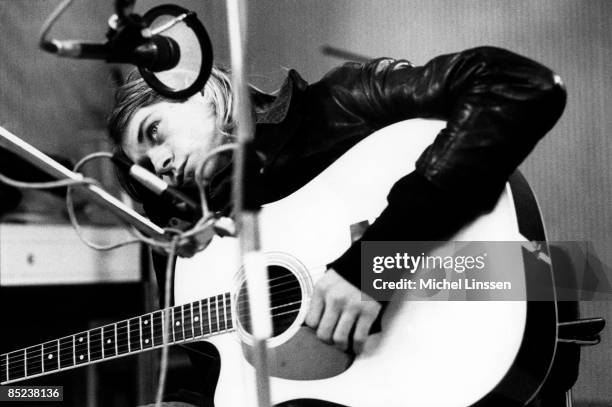 Photo of Kurt COBAIN and NIRVANA, Kurt Cobain recording in Hilversum Studios, with acoutsic guitar