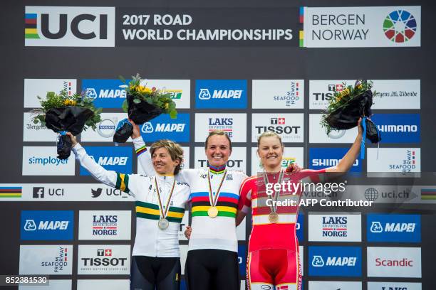 Gold medalist Netherlands' Chantal Blaak , silver medalist Australia's Katrin Garfoot and Denmark's Amalie Dideriksen pose with their medals after...