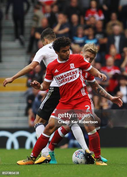 Fabio Da Silva of Middlesbrough holds of Tim Ream of Fulham during the Sky Bet Championship match between Fulham and Middlesbrough at Craven Cottage...