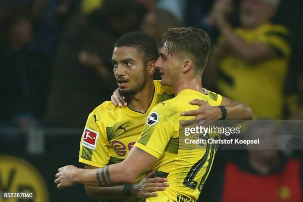 Maximilian Philipp of Dortmund celebrates with Jeremy Toljan of Dortmund after the scored to make it 2:0 during the Bundesliga match between Borussia...