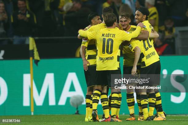 Maximilian Philipp of Dortmund celebrates with team mates after the scored to make it 2:0 during the Bundesliga match between Borussia Dortmund and...