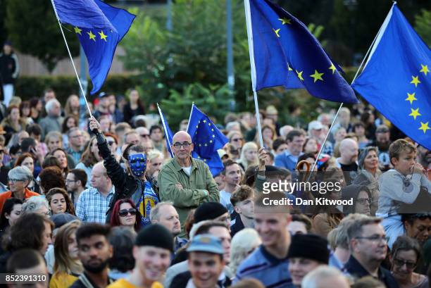 Pro EU supporters gather to watch Labour Leader Jeremy Corbyn during a Momentum Rally on the eve of the Labour Party Conference on September 23, 2017...