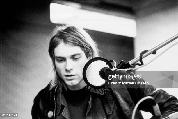 Photo of NIRVANA and Kurt COBAIN, Kurt Cobain recording in Hilversum Studios, with microphone