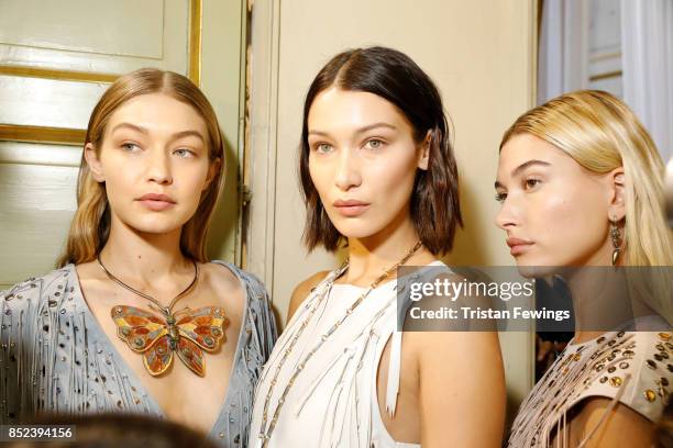 Gigi Hadid, Bella Hadid and Hailey Baldwin are seen backstage ahead of the Bottega Veneta show during Milan Fashion Week Spring/Summer 2018 on...