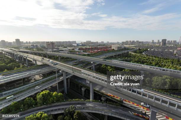 a complex multi-stack interchange in hangzhou,china - stack_interchange stock pictures, royalty-free photos & images
