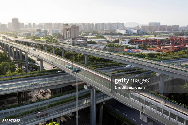 a complex multi-stack interchange in hangzhou,china - stack_interchange stock pictures, royalty-free photos & images