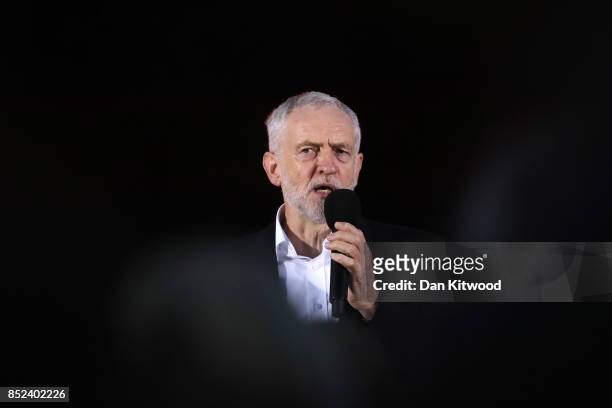Labour Leader Jeremy Corbyn addresses supporters during a Momentum Rally on the eve of the Labour Party Conference on September 23, 2017 in Brighton,...