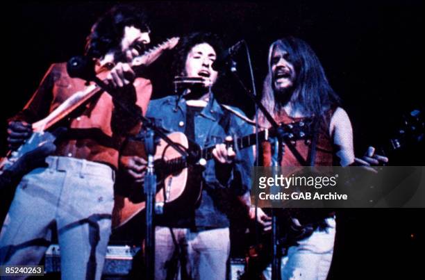 George Harrison, Bob Dylan and Leon Russell perform onstage at the Concert for Bangladesh which was held at Madison Square Garden on August 1, 1971...