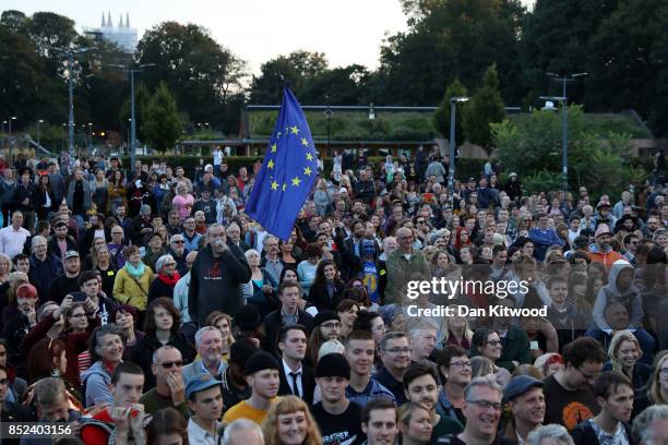 Supporters gather to watch Labour Leader Jeremy Corbyn during a Momentum Rally on the eve of the Labour Party Conference on September 23, 2017 in...