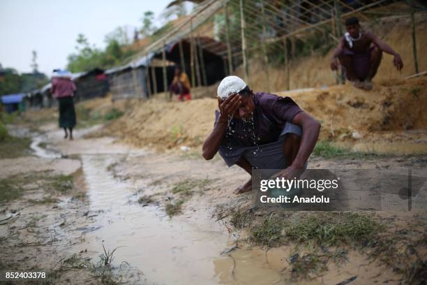 Rohingya Muslim washes his face at a makeshift camp in Teknaff, Bangladesh on September 23, 2017. Violence erupted in Myanmars Rakhine state on Aug....