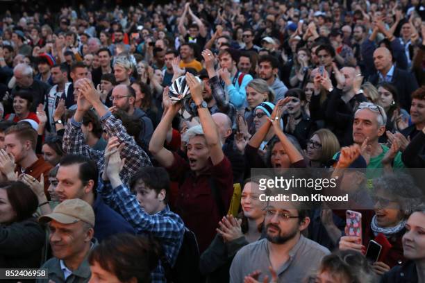 Supporters gather to watch Labour Leader Jeremy Corbyn during a Momentum Rally on the eve of the Labour Party Conference on September 23, 2017 in...
