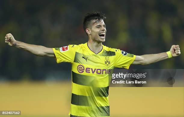Julian Weigl of Dortmund celebrates after he scored his teams sixth goal to make it 6:1 during the Bundesliga match between Borussia Dortmund and...