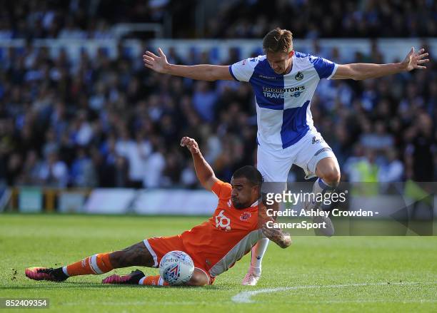 Blackpool's Kyle Vassell vies for possession with Bristol Rovers' Joe Partington during the Sky Bet League One match between Bristol Rovers and...
