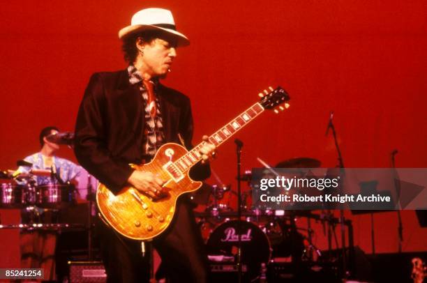 Photo of Kirk HAMMETT and METALLICA; of Metallica, performing live onstage, playing Gibson Les Paul guitar