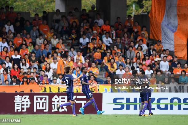 Hiroki Mizumoto of Sanfrecce Hiroshima celebrates scoring the opening goal with his team mates during the J.League J1 match between Shimizu S-Pulse...