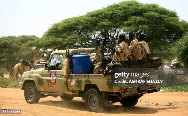 Sudanese members of the Rapid Support Forces, a paramilitary force backed by the Sudanese government to fight rebels and guard the Sudan-Libya...