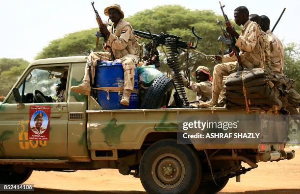 Sudanese members of the Rapid Support Forces, a paramilitary force backed by the Sudanese government to fight rebels and guard the Sudan-Libya...