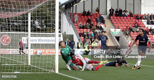 Fleetwood Town's Devante Cole scores his sides second goal past Southend United's Mark Oxley during the Sky Bet League One match between Fleetwood...