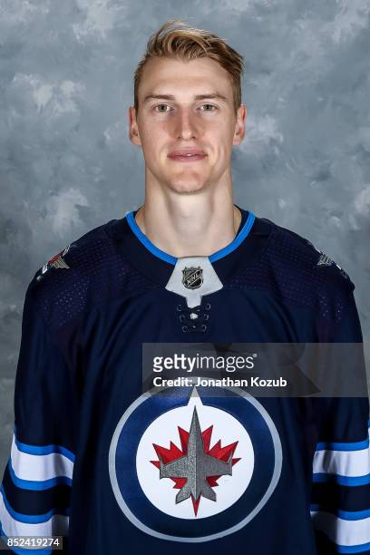 Tyler Myers of the Winnipeg Jets poses for his official headshot for the 2017-2018 season on September 14, 2017 at the Bell MTS Iceplex in Winnipeg,...
