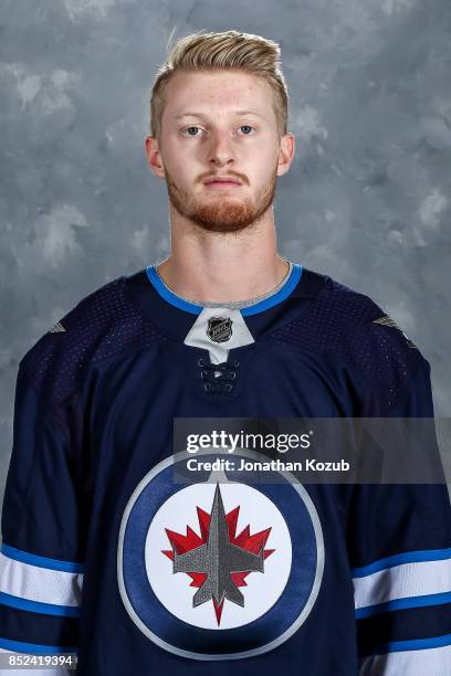 Kyle Connor of the Winnipeg Jets poses for his official headshot for the 2017-2018 season on September 14, 2017 at the Bell MTS Iceplex in Winnipeg,...