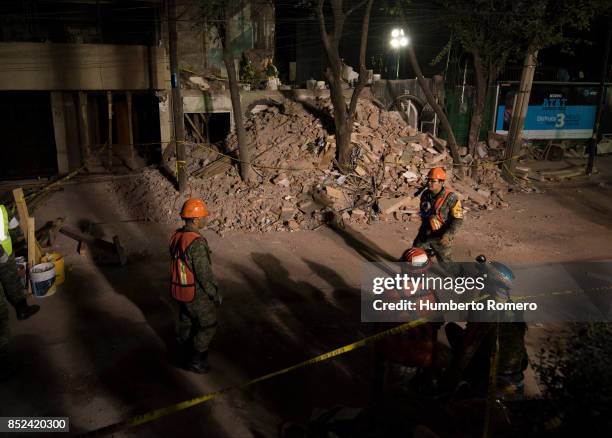 Rescuers search for survivors three days after the magnitude 7.1 earthquake jolted central Mexico killing more than 200 hundred people, damaging...