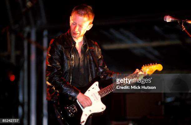 Photo of RADIOHEAD and Thom YORKE, Thom Yorke performing live onstage, playing Fender Jazzmaster guitar