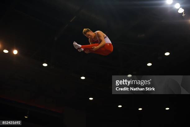 Jamie Gibney of Great Britain competes during the Trampoline, Tumbling & DMT British Championships at the Echo Arena on September 23, 2017 in...