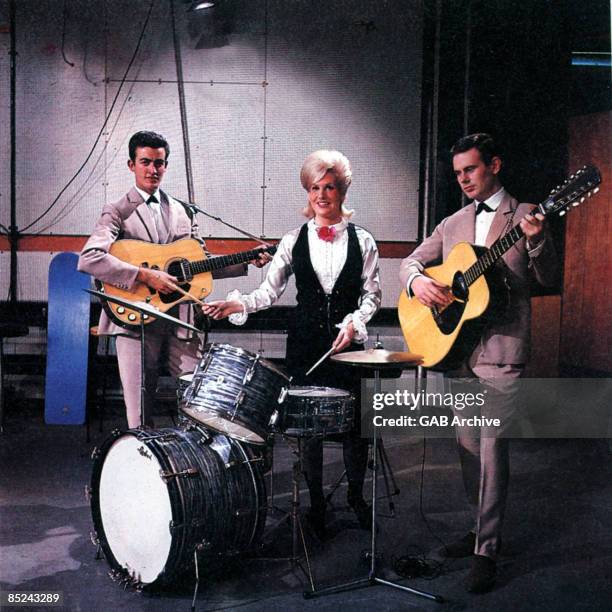 Photo of Tom SPRINGFIELD and Dusty SPRINGFIELD and Mike HURST and SPRINGFIELDS, L-R Mike Hurst, Dusty Springfield, Tom Springfield posed on the set...