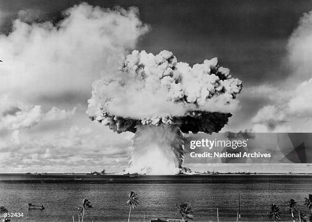 An atomic cloud rises July 25, 1946 during the "Baker Day" blast at Bikini Island in the Pacific.
