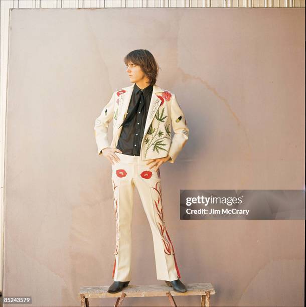 Photo of Gram PARSONS; In front of A&M Records Photo Studio in suit specially made for him by "Nudie, the rodeo tailor"