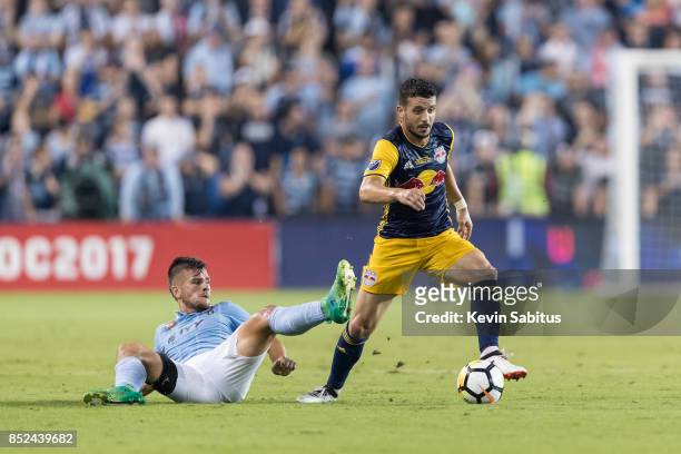 Felipe Martins of New York Red Bulls controls the ball past Ilie Sanchez of Sporting Kansas City in the US Open Cup Final match at Children's Mercy...