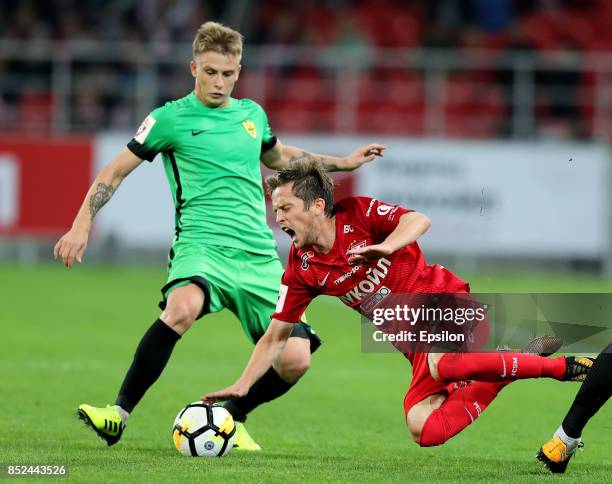 Jano Ananidze of FC Spartak Moscow vies for the ball with Oleh Danchenko of FC Anzhi Makhachkala during the Russian Premier League match between FC...