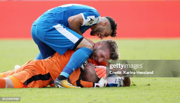 Davud Tuma, Goalkeeper Raphael Koczor and Manfred Starke of Jena celebrate the second goal during the 3.Liga match between FC Carl Zeiss Jena and SC...